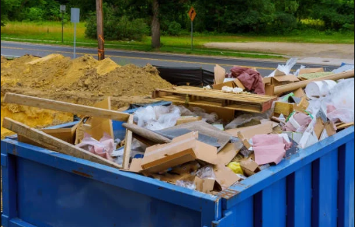 Dumpster filled with construction and demolition debris